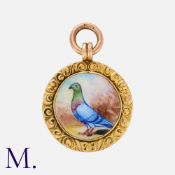 An Enamel Miniature Pendant in 9k yellow gold, comprising an enamelled miniature of a pigeon, within