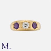 An Amethyst And Diamond Gypsy in 18k yellow gold, set with a central old cut diamond of