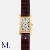 CARTIER, A Tank Americaine Wristwatch in 18k yellow gold, ref. 811904, The silvered dial with