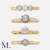 A Collection of Diamond Rings in 18k yellow gold and platinum. Comprising three diamond solitaires