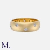 TIFFANY & Co. A Diamond Etoile Ring in 18K yellow gold, with diamond accents around the