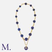 A Lapis Lazuli Collar in yellow gold, with large lapis lazuli spherical beads tapering in size