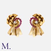 A Pair of Ruby and Diamond Retro Earrings in yellow gold, each set with an old cut diamond