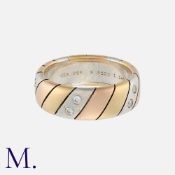 VAN CLEEF & ARPELS. A Diamond Ring in 18K yellow, white and rose gold, set with ten round