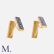 HERMES. A Pair of Sapphire Cufflinks in 18K yellow gold in butterfly wing form, set with