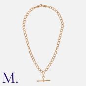 An Albert Chain in 9k yellow gold, comprising a series of interlocking curb links, each marked 9.