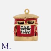An Enamel Post Box Charm in 9k yellow gold, designed as a post box, with enamelled decoration.