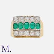 An Emerald and Diamond Three Row Ring in yellow gold, comprising a row of five step cut emeralds,