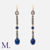 A Pair of Sapphire and Diamond Earrings in yellow gold and silver, each comprising an old cut