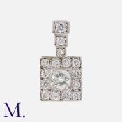 A Diamond Pendant in yellow and white gold, set with round cut diamonds all totalling