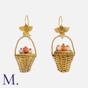 A Pair of Coral Earrings in yellow gold, designed as flower baskets set with coral bead 'flowers'.