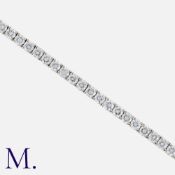 A 5.30 Carat Diamond Line Bracelet in 18k white gold, set with a row of round cut diamonds totalling