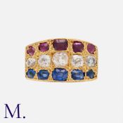 An Edwardian Ruby, Diamond and Sapphire Ring in 18ct yellow gold set with rubies (approx. 0.40ct),