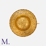 An Antique Brooch in yellow gold, of Etruscan revival style, the domed form decorated with fine