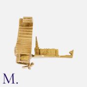 A Cathedral Charm in 9k yellow gold. Marked indistinctly for 9 carat gold. Size: 3.2cm Weight: 6.9g