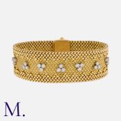 GEORGES LENFANT. A Diamond Bracelet in 18K yellow gold in the Tissu Polonais woven form with