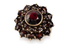 GARNET CLUSTER RING, MID 20TH CENTURY