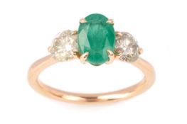 EMERALD AND DIAMOND THREE STONE RING,