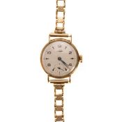 LONGINES, NINE CARAT GOLD MANUAL WIND WRIST WATCH