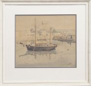 JOHN WILLIAM GILROY (BRITISH 1868 - 1944), A KETCH AT ANCHOR IN A HARBOUR