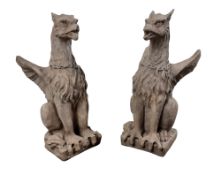 PAIR OF STONE GRYPHONS,