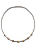 Riviere brilliant-cut diamonds and orange-coloured sapphires necklace