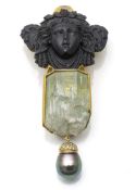 Unusual author's brooch with bacchante