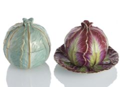 TWO COAL HEAD SHAPED TUREENS AND COVERS