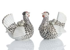 A PAIR OF POULTRY SHAPED TUREENS AND LIDS
