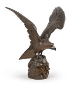 A SWISS CARVED WALNUT EAGLE