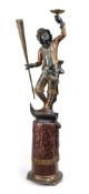 AN ITALIAN POLYCHROME DECORATED BLACKAMOOR
