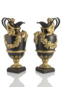 A PAIR OF NEOCLASSICAL PATINATED AND GILT BRONZE FIGURAL WINE JARS