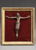 A ROMANESQUE BRONZE FIGURE OF THE CRUCIFIED CHRIST