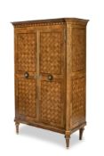 A SOUTH GERMAN ORMOLU-MOUNTED ALDER AND FRUITWOOD PARKETRY CUPBOARD