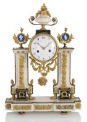 A LOUIS XVI ORMOLU AND PORCELAIN MOUNTED MARBLE PENDULE