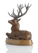 A RECUMBENT DEER