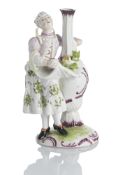 A BULGARIAN WOMAN WITH VASE