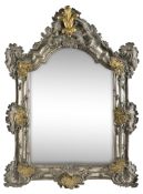 A COPPERPLATED AND GILTBRASS MOUNTED BAROQUE MIRROR