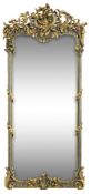 A LARGE SOUTH GERMAN PARCEL-GILT AND GREEN PAINTED CARVED LIMEWOOD MIRROR
