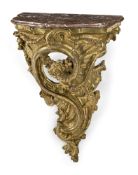A SMALL CARVED AND GILT WOOD WALL CONSOLE