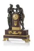 A LARGE FRENCH PATINATED BRONZE AND ORMOLU MOUNTED MARBLE PENDULE