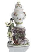 A POTPOURRI VASE AND COVER WITH HUNTER AND DOG ON A ROCKET
