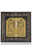 BODY OF CHRIST IN A DECORATIVE STONE SET FRAME