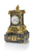 AN OPULENT LOUIS XVI STYLE ORMOLU MOUNTED MARBLE PENDULE