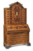 A BAROQUE BRASS MOUNTED WALNUT ASH PLUM AND ROOTWOOD WRITING CABINET WITH IVORY AND BONE INLAY