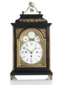 AN EBONIZED WOOD STUTZUHR TABLE CLOCK
