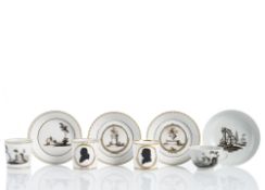 FOUR CUPS AND SAUCERS