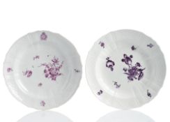 TWO FLORAL PAINTED PLATES