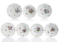 SIX PLATES AND A SMALL ROUND BOWL