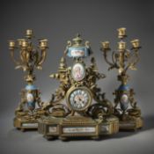 A PENDULE AND A MATCHING PAIR OF CHANDELIERS